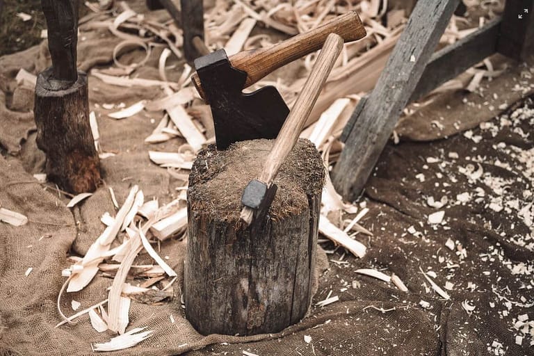 two axe on stump